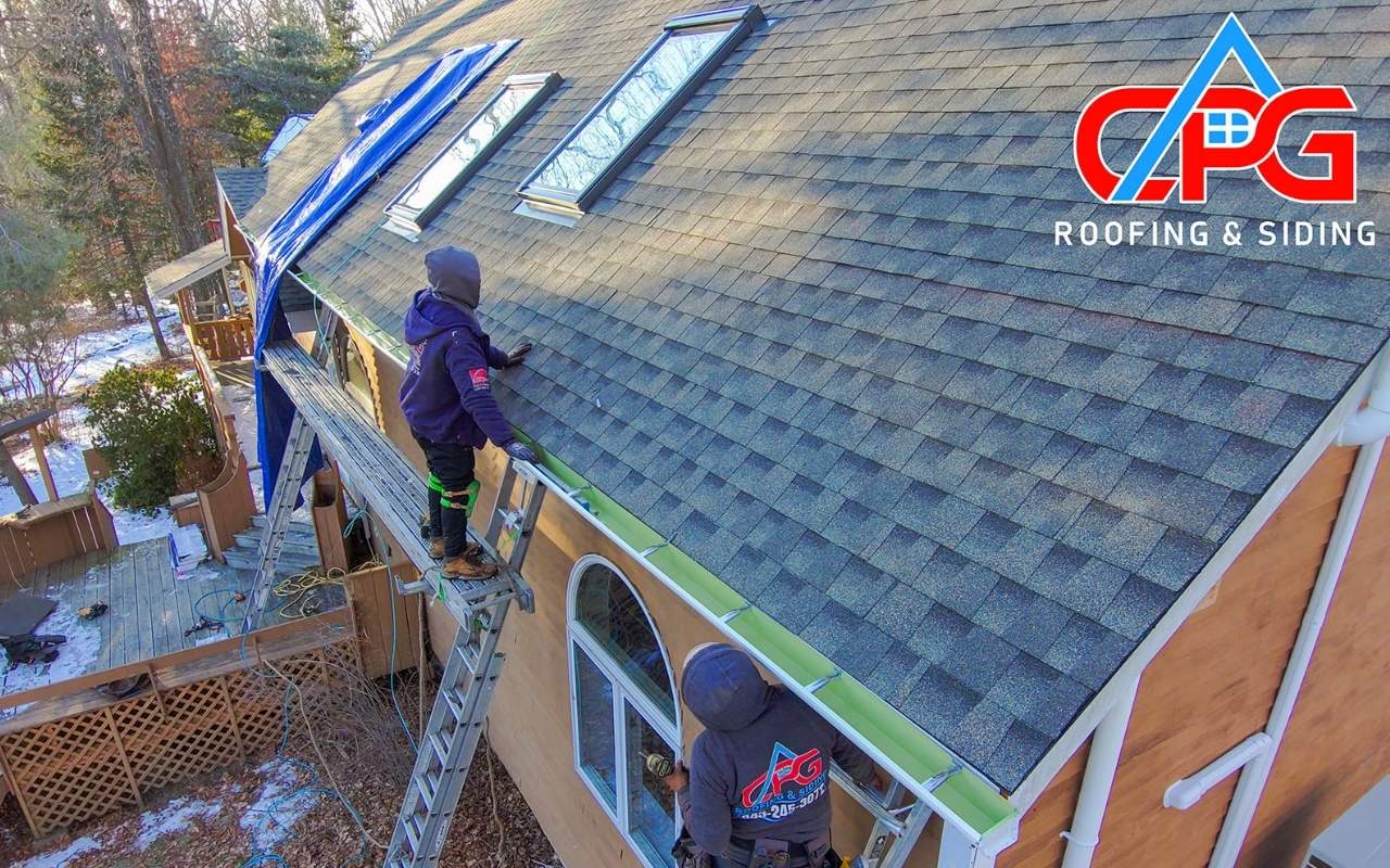 Roof maintenance work being done to prevent water damage