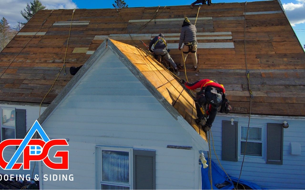 Contractor conducting roof inspection on a residential home
