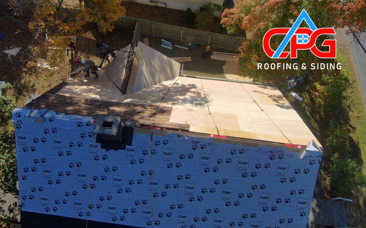 Licensed roofing contractor performing a full roof inspection