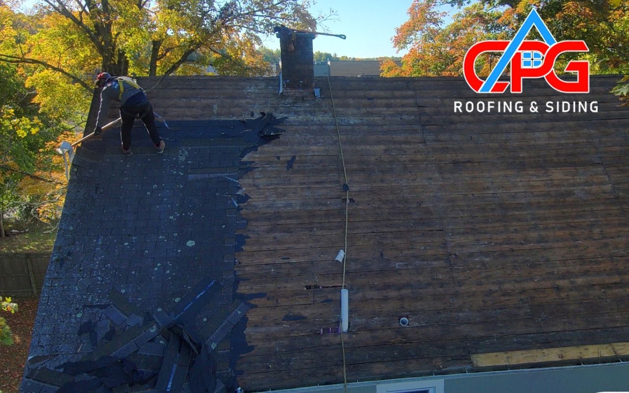 Missing shingles being replaced to prevent water infiltration