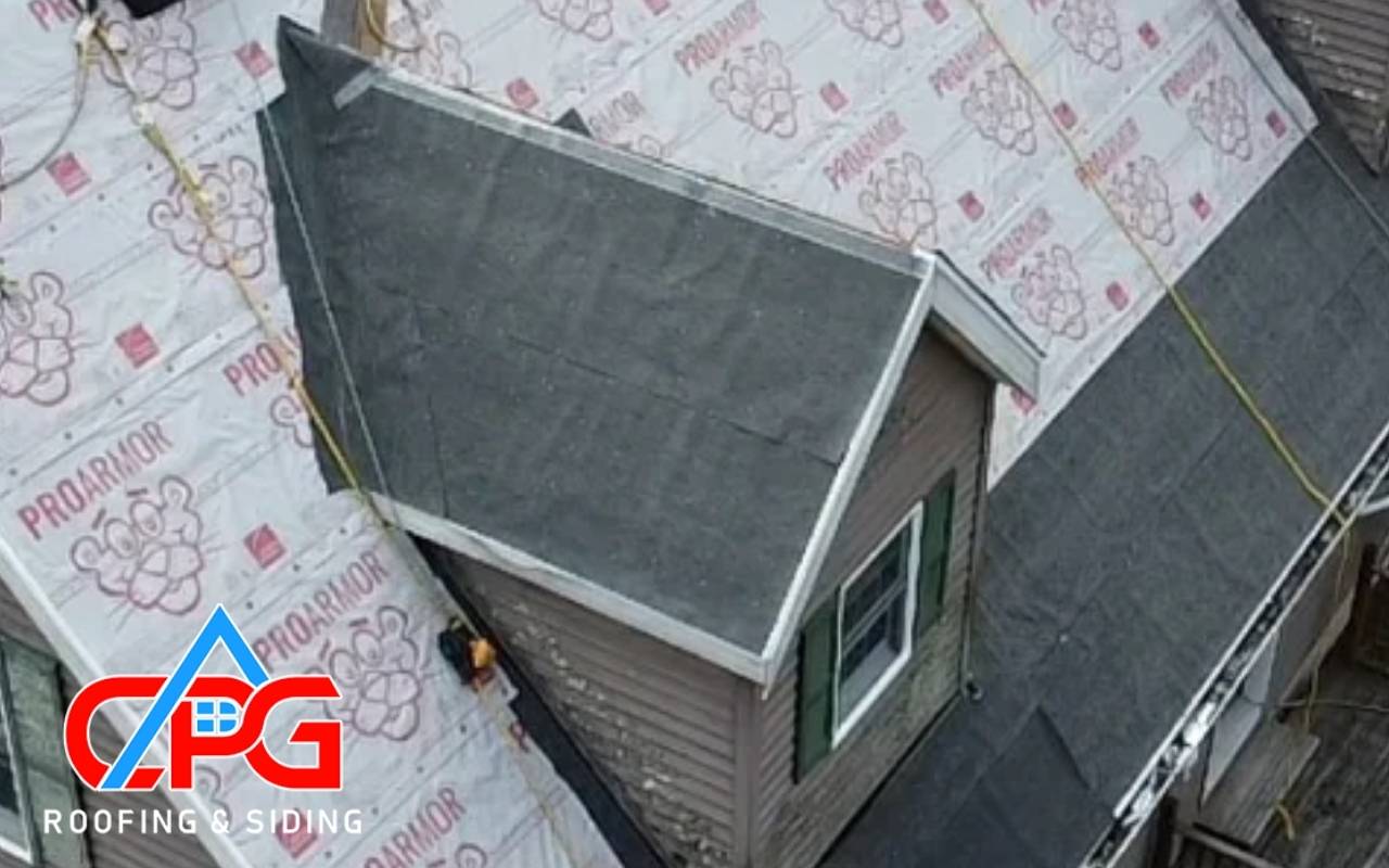 Storm-damaged roof needing emergency replacement services