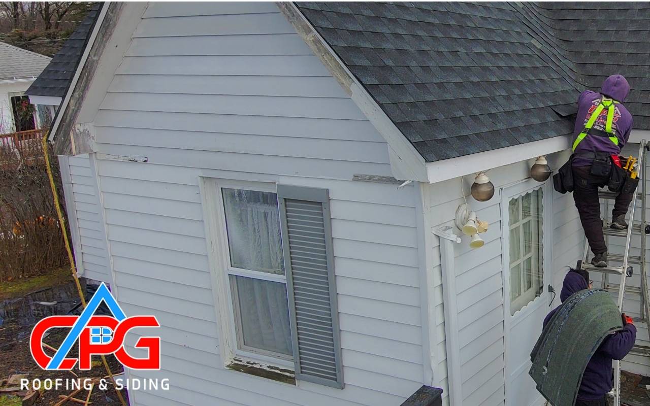Various types of siding displayed on different home exteriors
